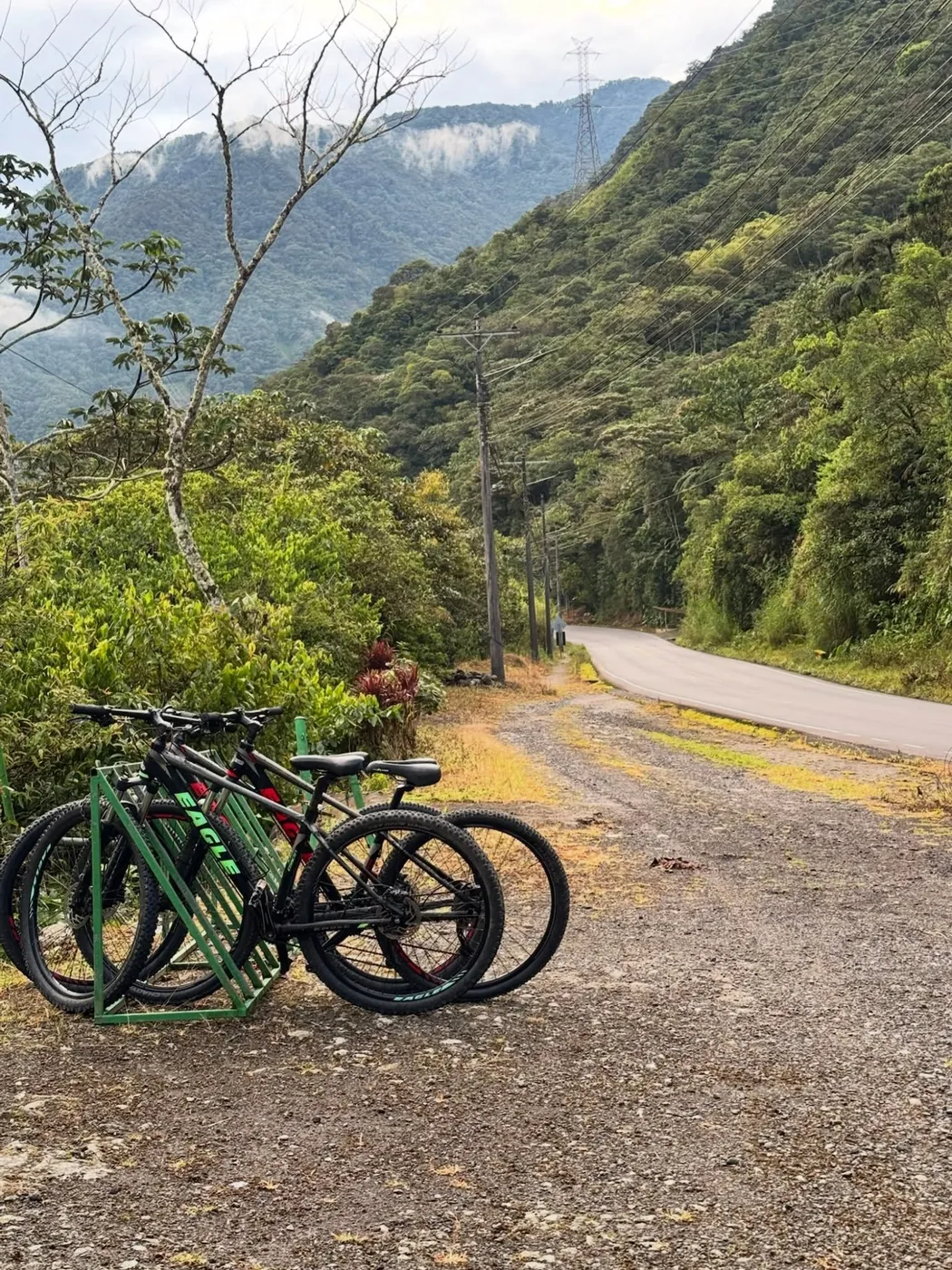 Bikes parked on a mountain road, Baños