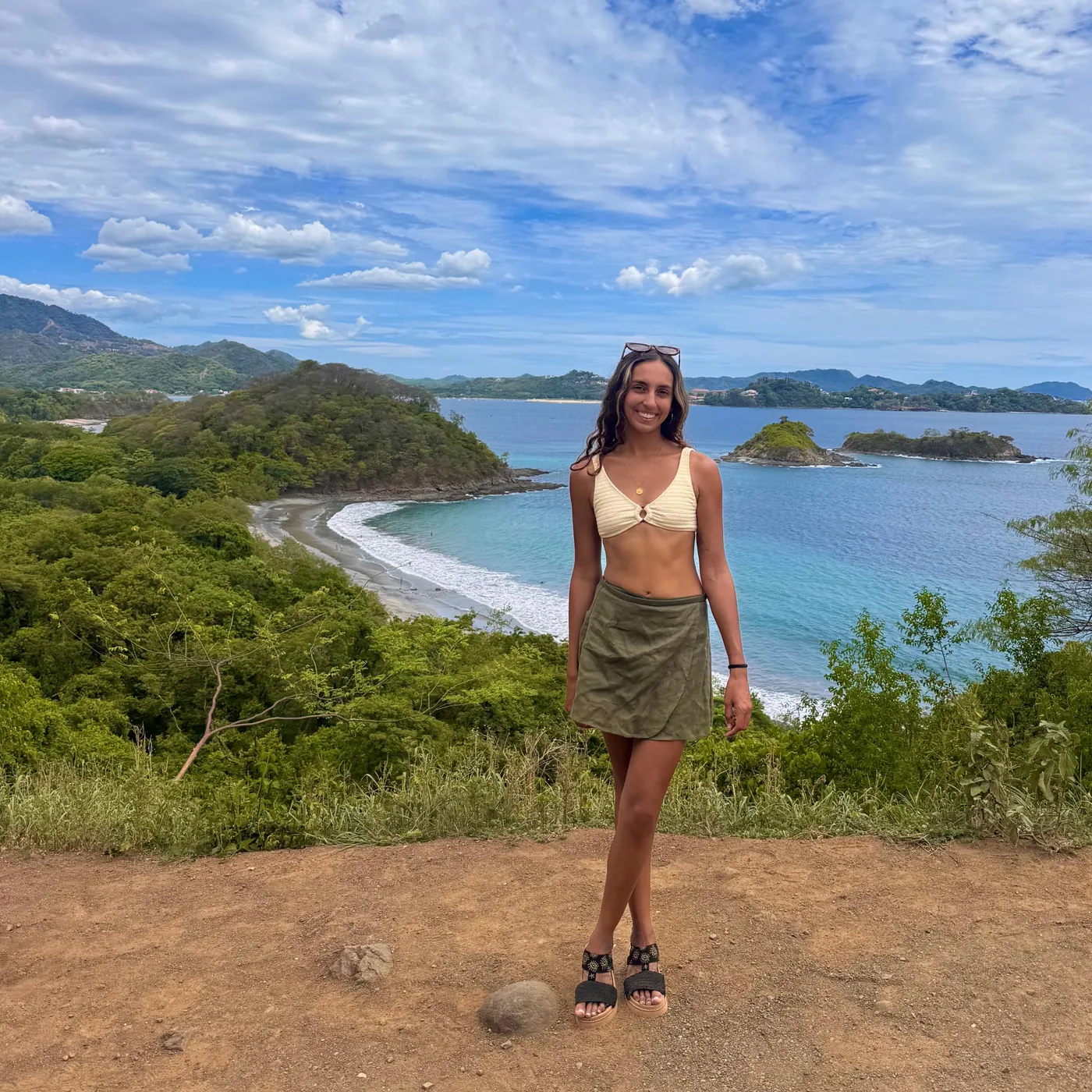 Natasha above a green bay
