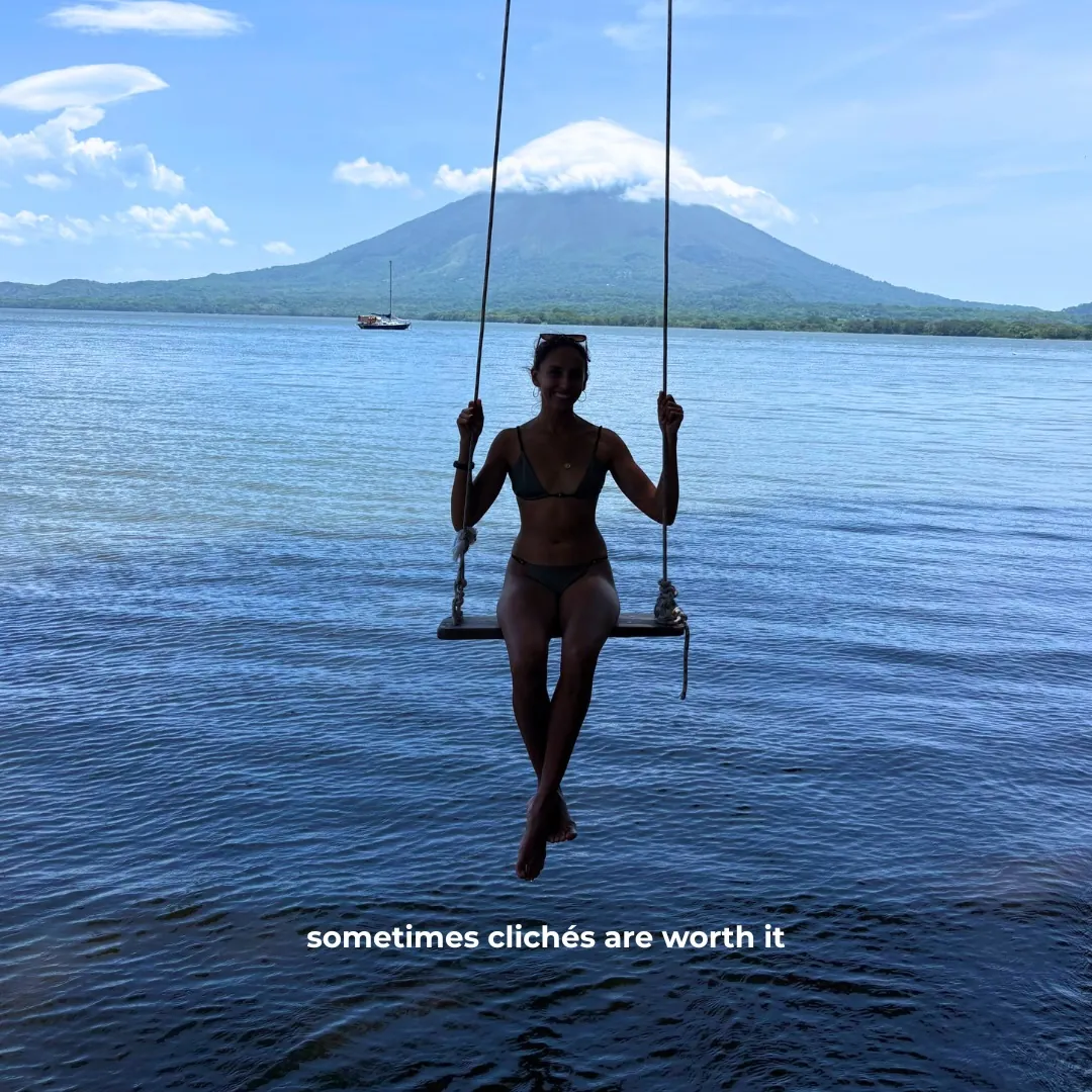 On a rope swing over the lake in front of the Concepción volcano, Ometepe