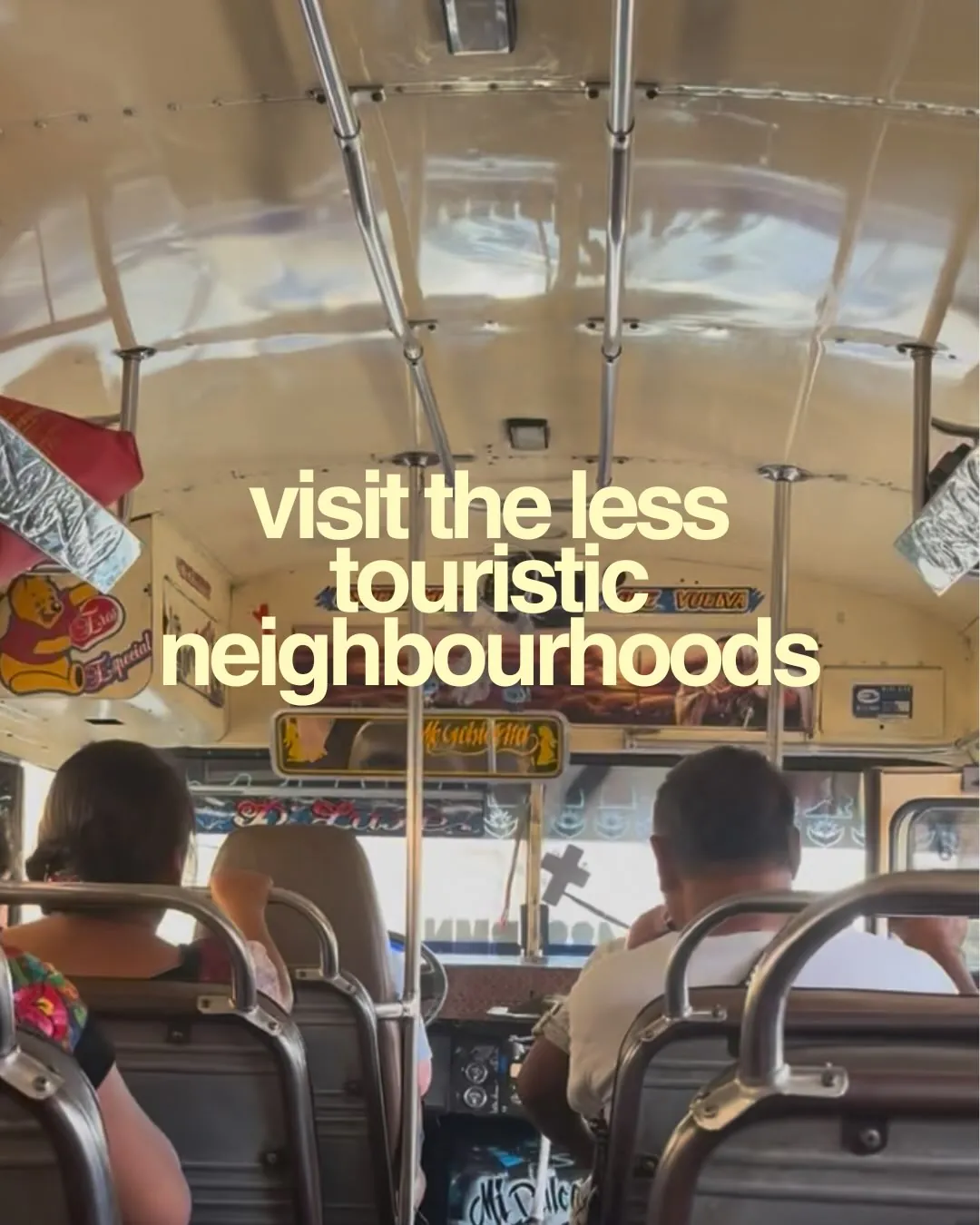 visit the less touristic neighbourhoods. Inside a local bus